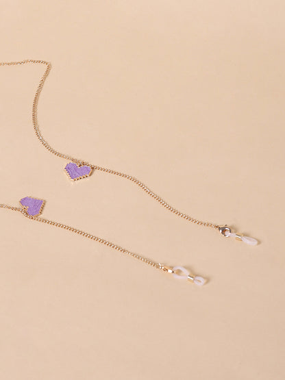 Misbeliv Pink Heart-Shaped Gold-Tone Sunglasses Chain.